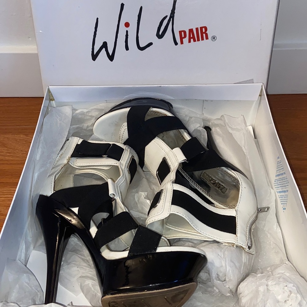 SOLD!!! WILD PAIR PLATFORM HEELS SIZE 7